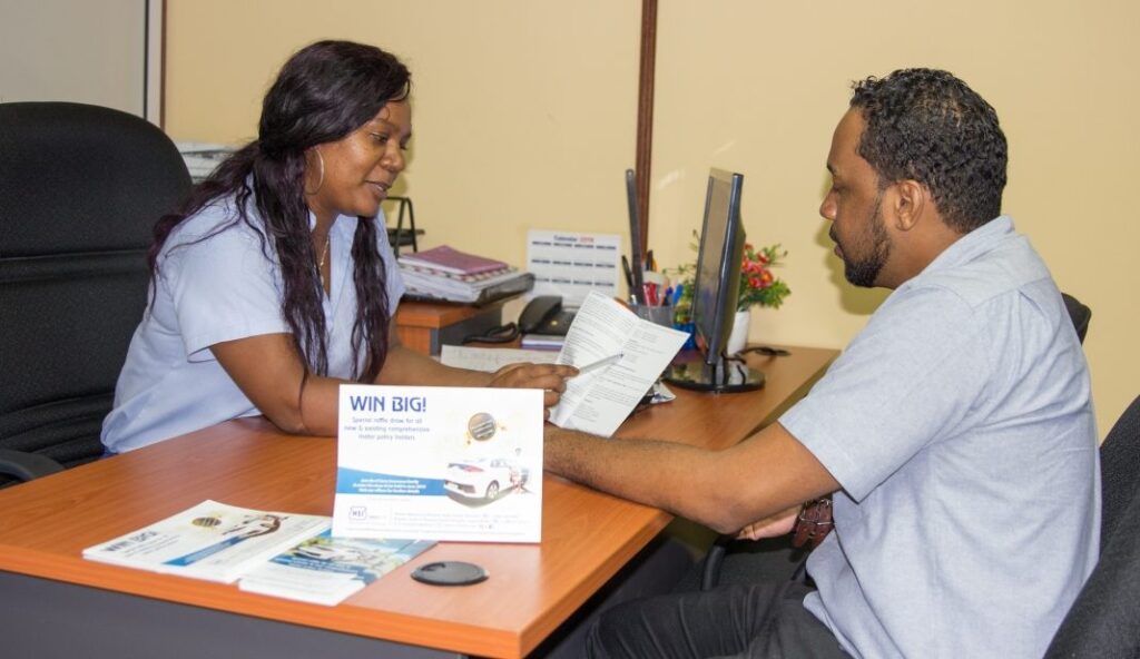 An HSI advisor talking a client through a policy